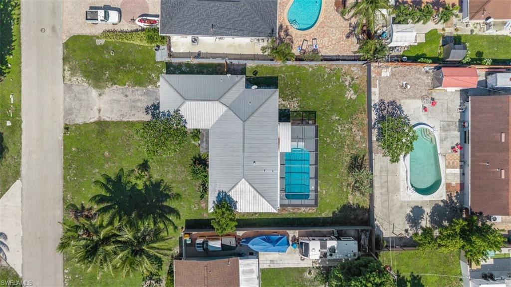 1948 46th Street Southwest Naples, FL 34116 - Photo 40 of 42 Drone / aerial view of a pool