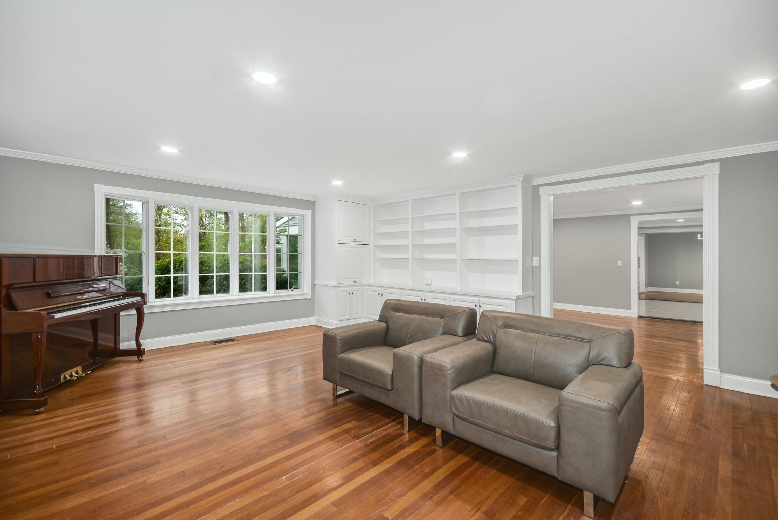 87 Juniper Road New Canaan, CT 06840 - Photo 13 of 28 a living room with furniture and a wooden floor