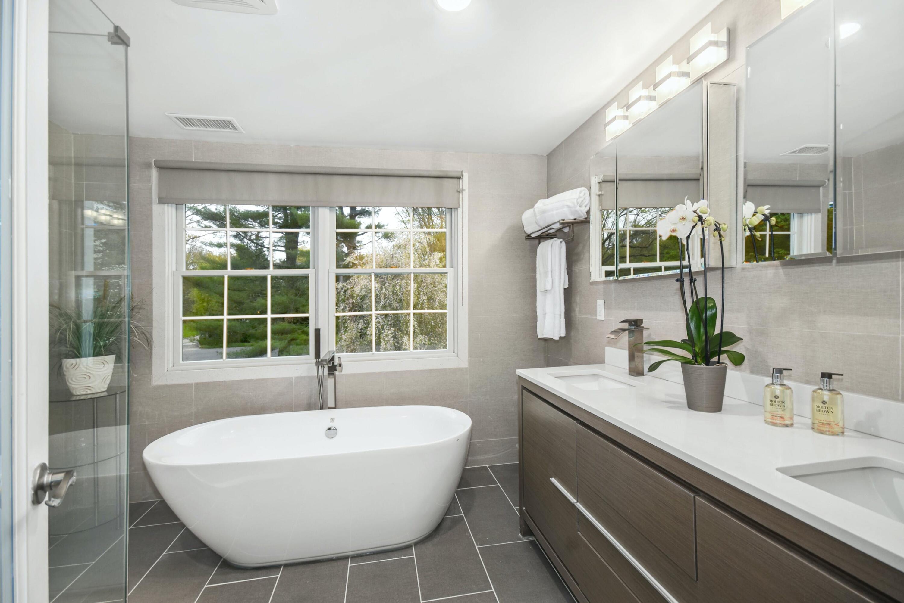 87 Juniper Road New Canaan, CT 06840 - Photo 16 of 28 a bathroom with a sink and a mirror