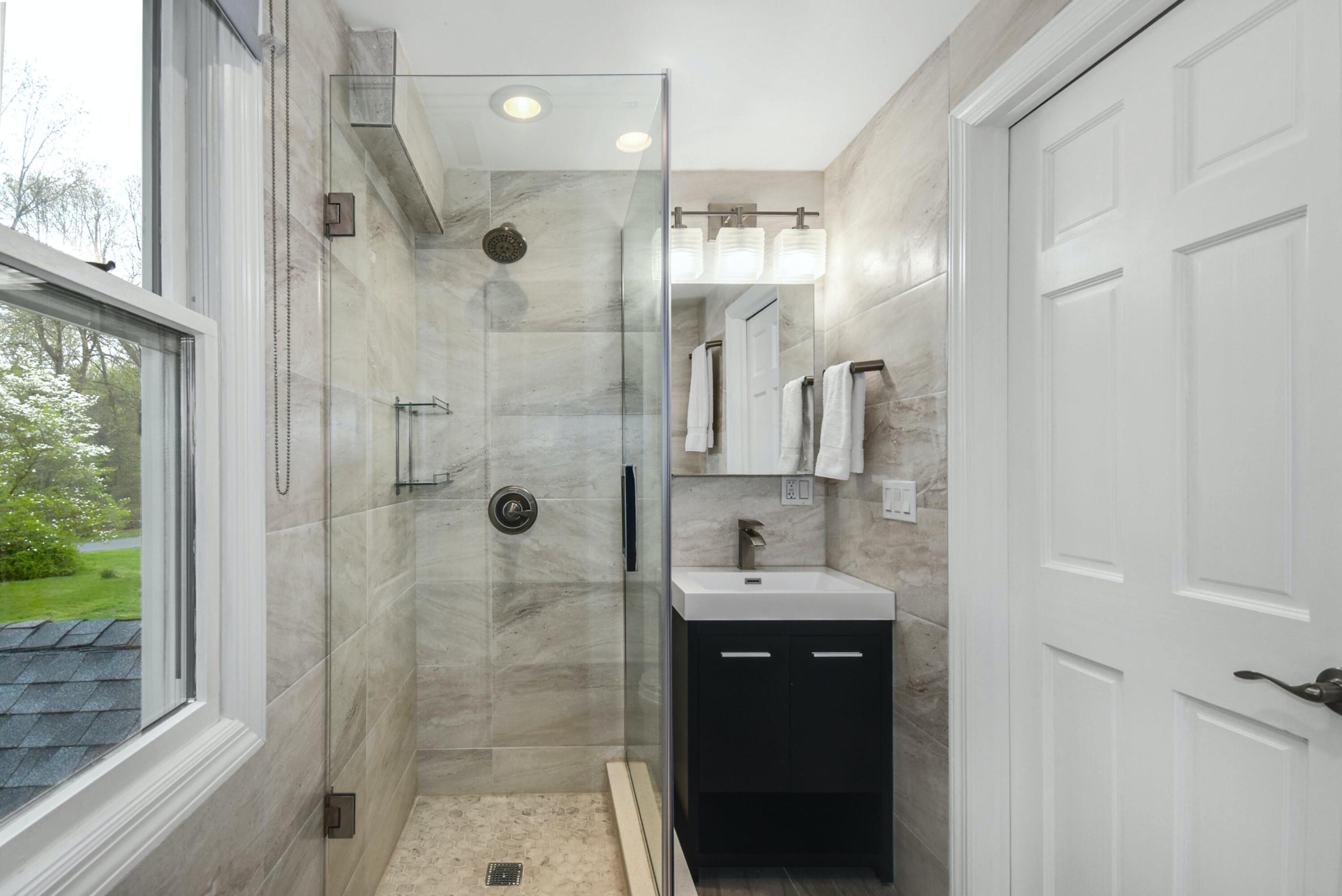 87 Juniper Road New Canaan, CT 06840 - Photo 21 of 28 a bathroom with a shower and a sink
