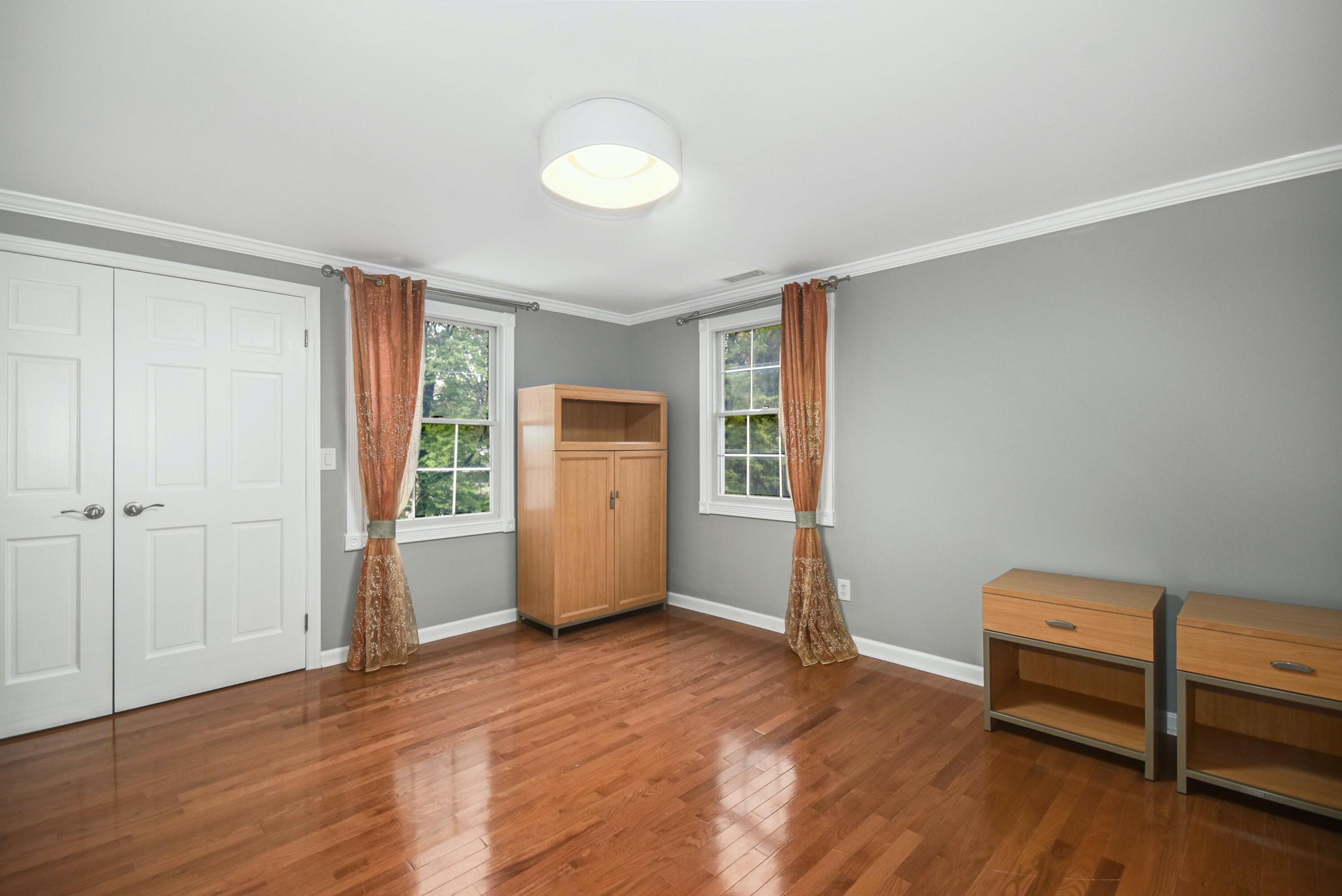 87 Juniper Road New Canaan, CT 06840 - Photo 22 of 28 a view of livingroom with furniture and wooden floor