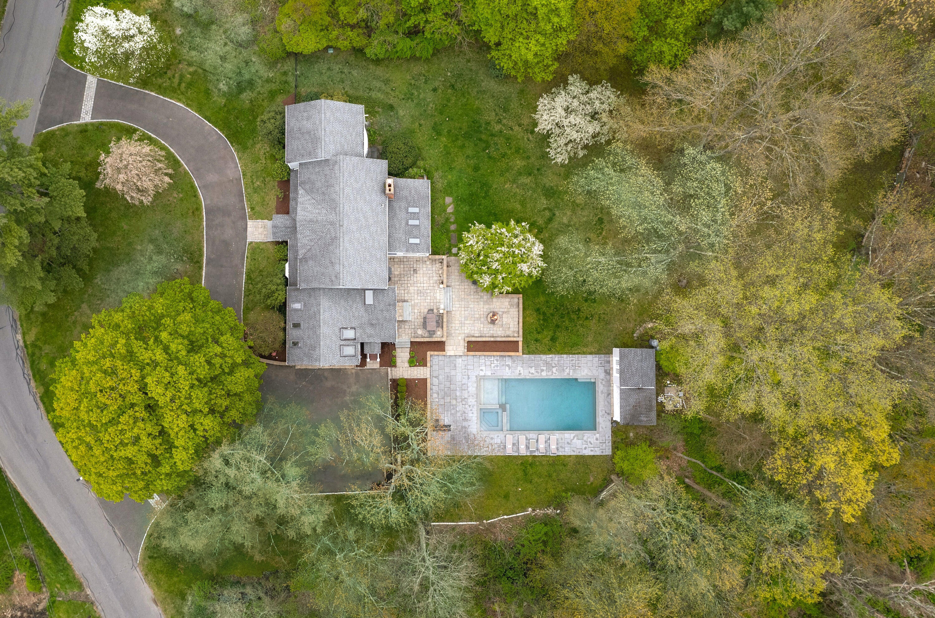87 Juniper Road New Canaan, CT 06840 - Photo 25 of 28 an aerial view of a house with outdoor space and street view