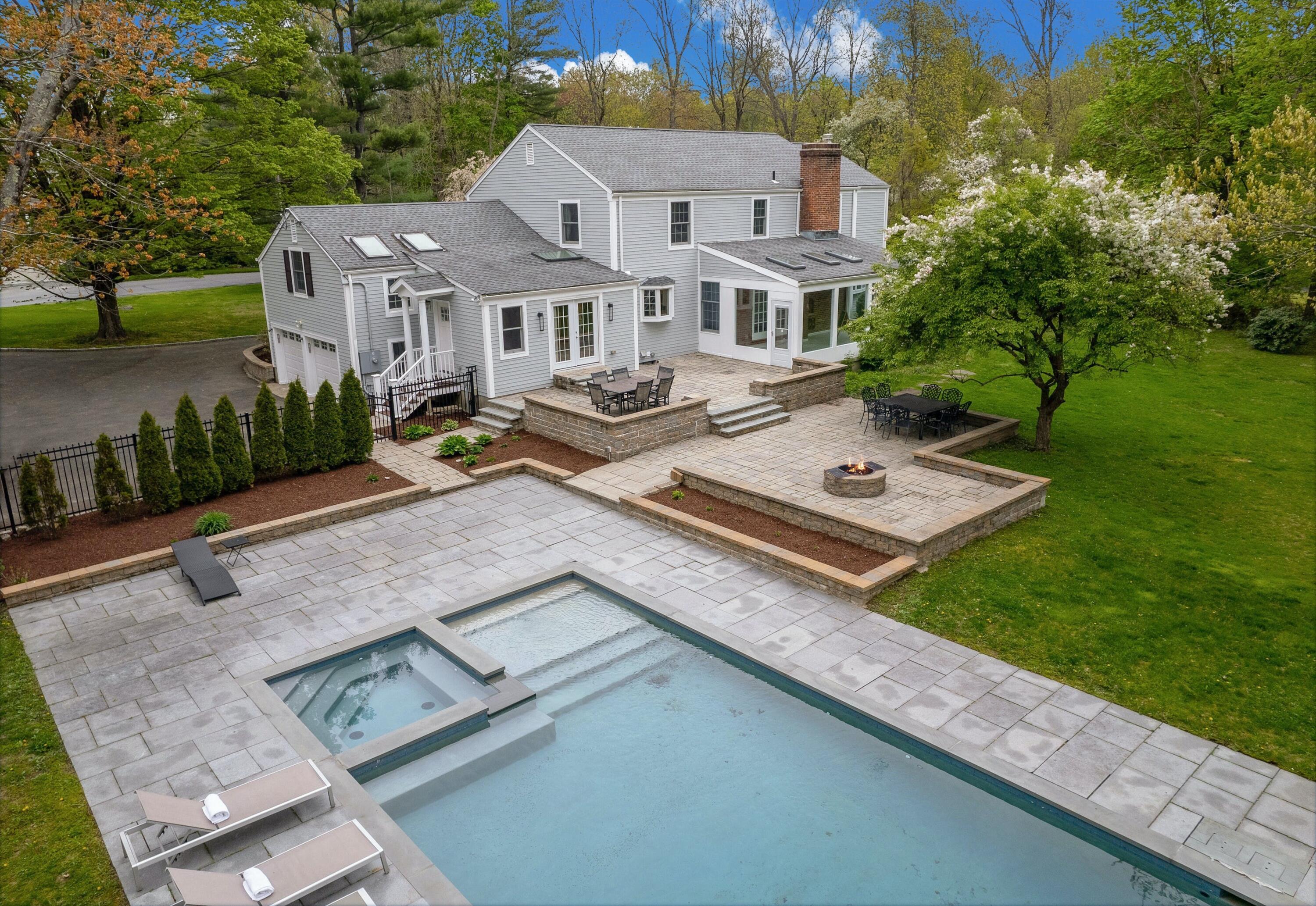 87 Juniper Road New Canaan, CT 06840 - Photo 3 of 28 a aerial view of a house with garden space and sitting area