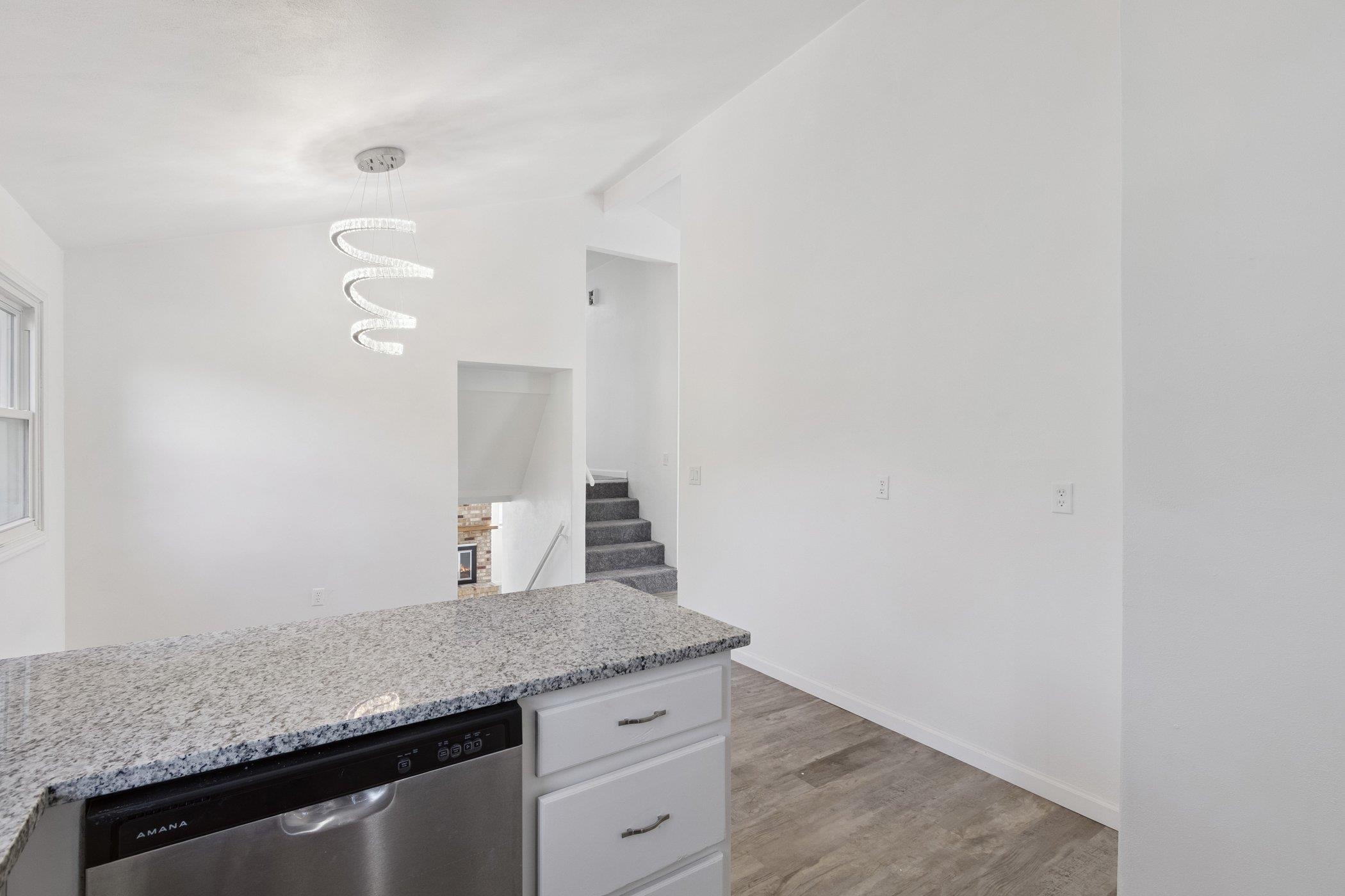 2724 Norway Pine Road Rockford, IL 61109 - Photo 13 of 49 a bathroom with a granite countertop sink and a mirror