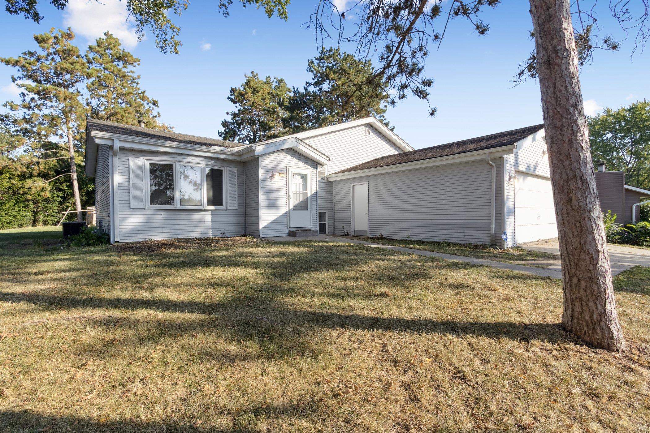 2724 Norway Pine Road Rockford, IL 61109 - Photo 2 of 49 a view of a house with a yard