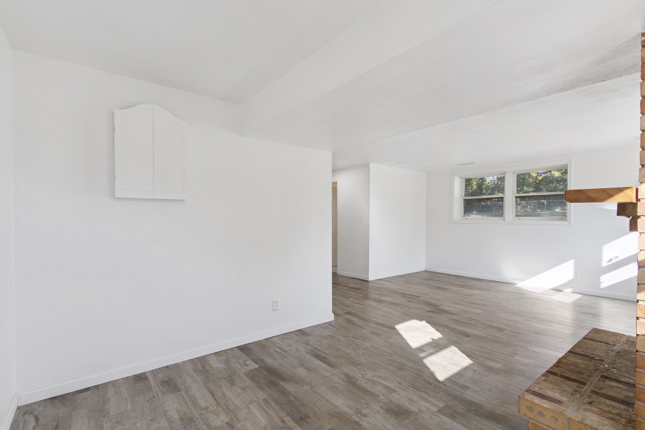 2724 Norway Pine Road Rockford, IL 61109 - Photo 21 of 49 a view of empty room with wooden floor and fan
