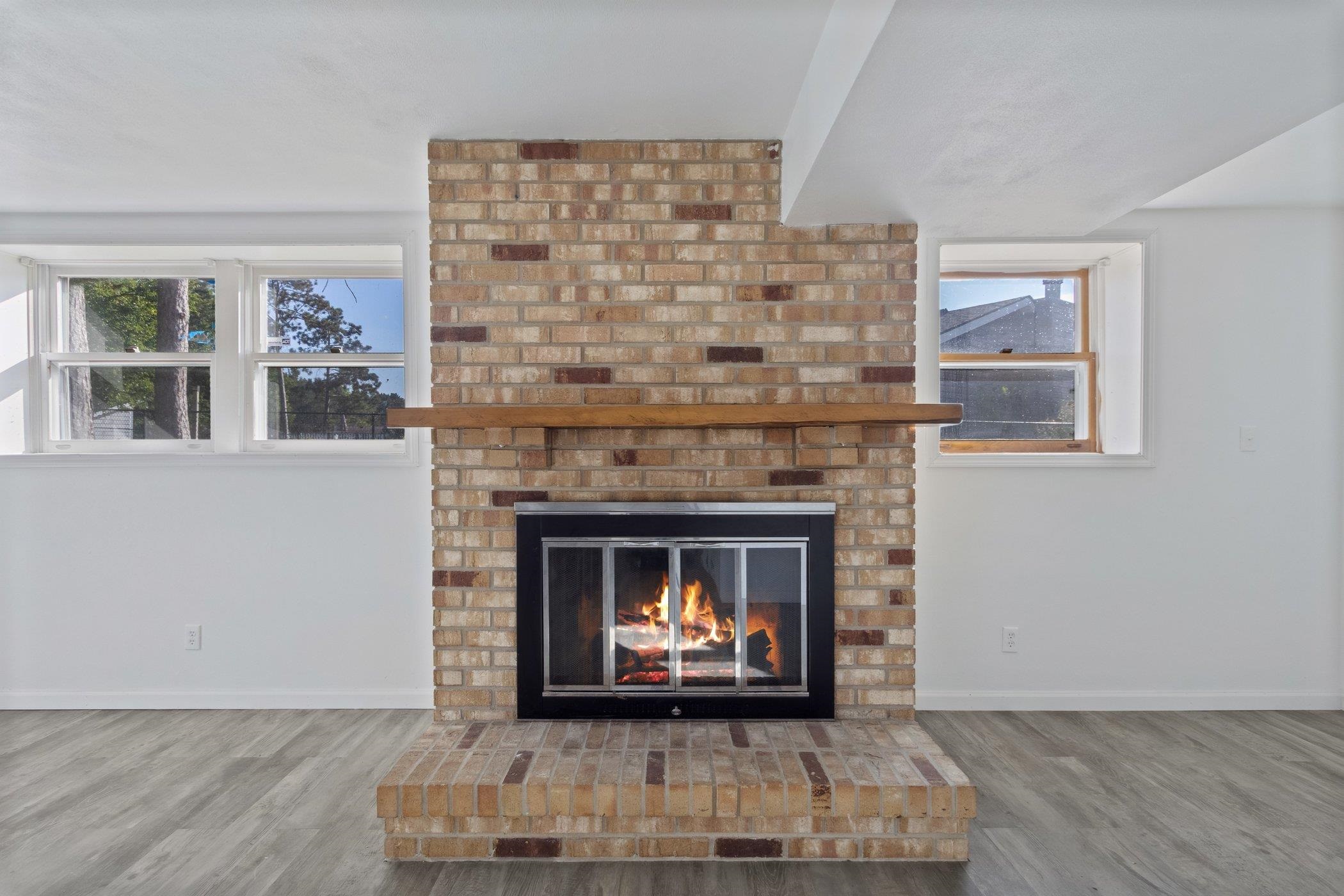 2724 Norway Pine Road Rockford, IL 61109 - Photo 23 of 49 a living room with a fireplace