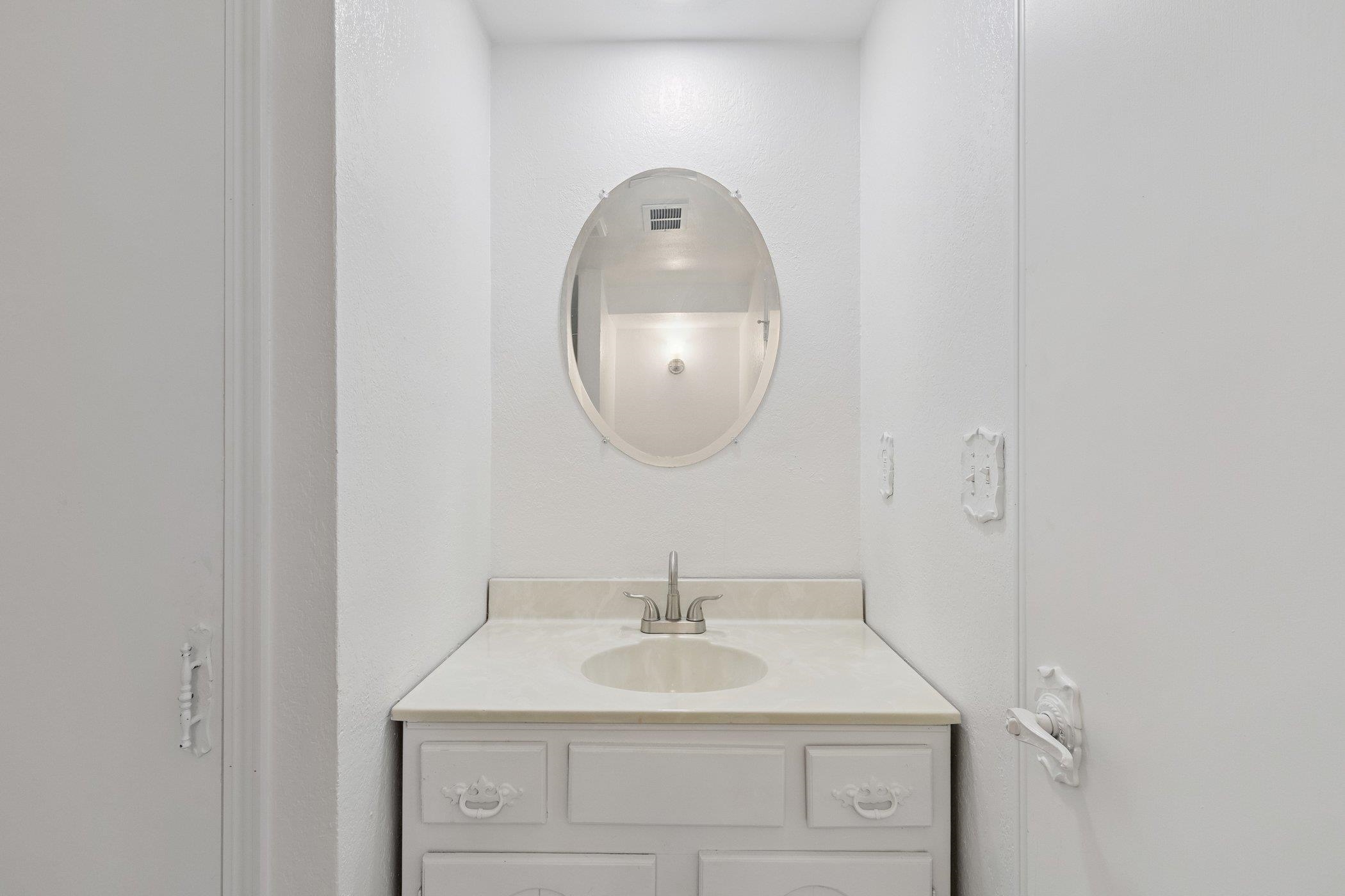 2724 Norway Pine Road Rockford, IL 61109 - Photo 26 of 49 a bathroom with a sink and a mirror