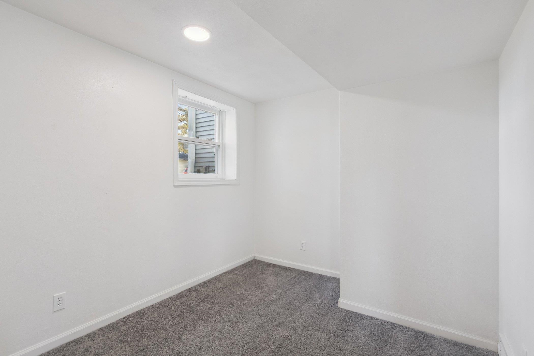 2724 Norway Pine Road Rockford, IL 61109 - Photo 28 of 49 an empty room with windows