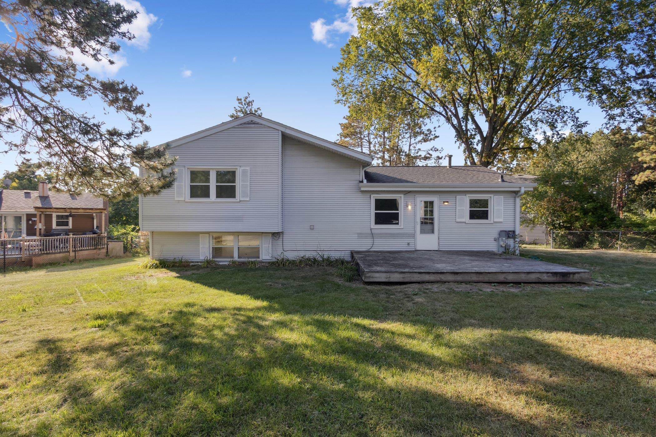 2724 Norway Pine Road Rockford, IL 61109 - Photo 45 of 49 a view of a yard with a house in the background