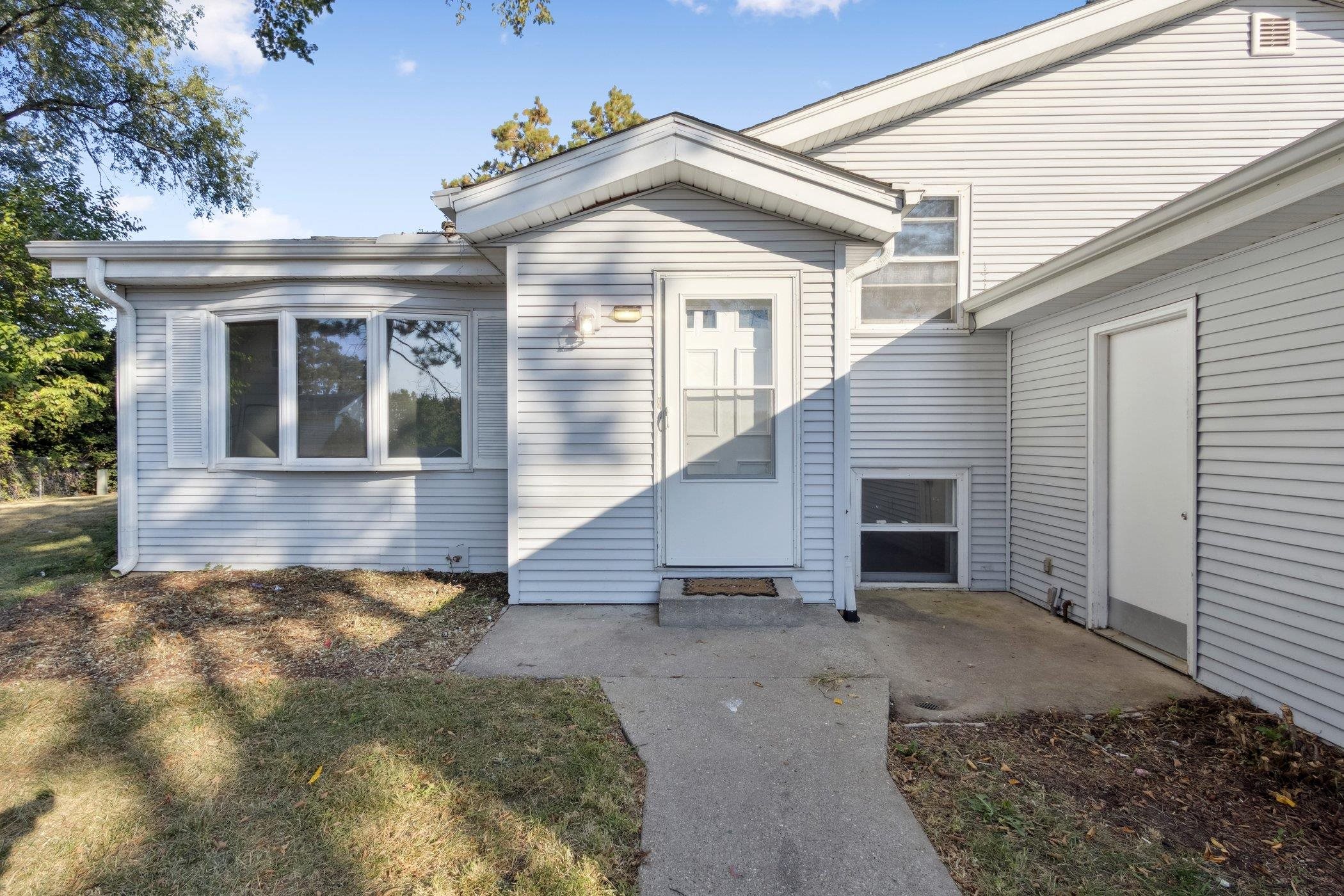 2724 Norway Pine Road Rockford, IL 61109 - Photo 5 of 49 a front view of a house with garden