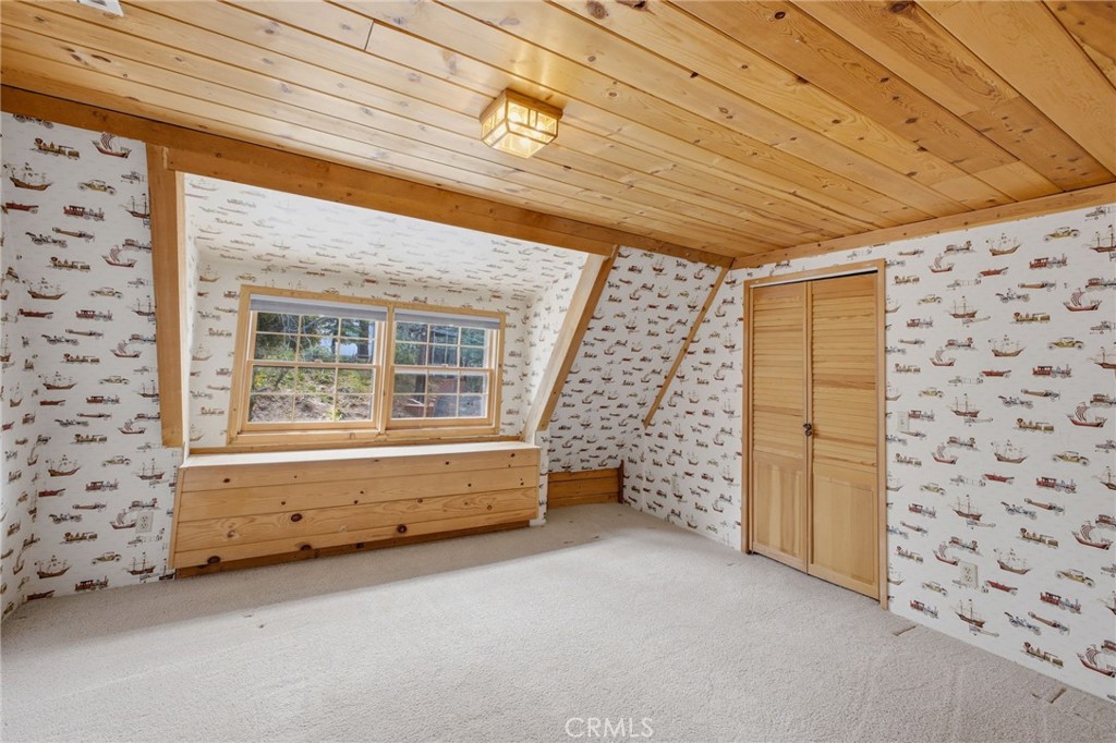 33052 Donner Lane Running Springs, CA 92382 - Photo 23 of 36 a view of empty room with windows