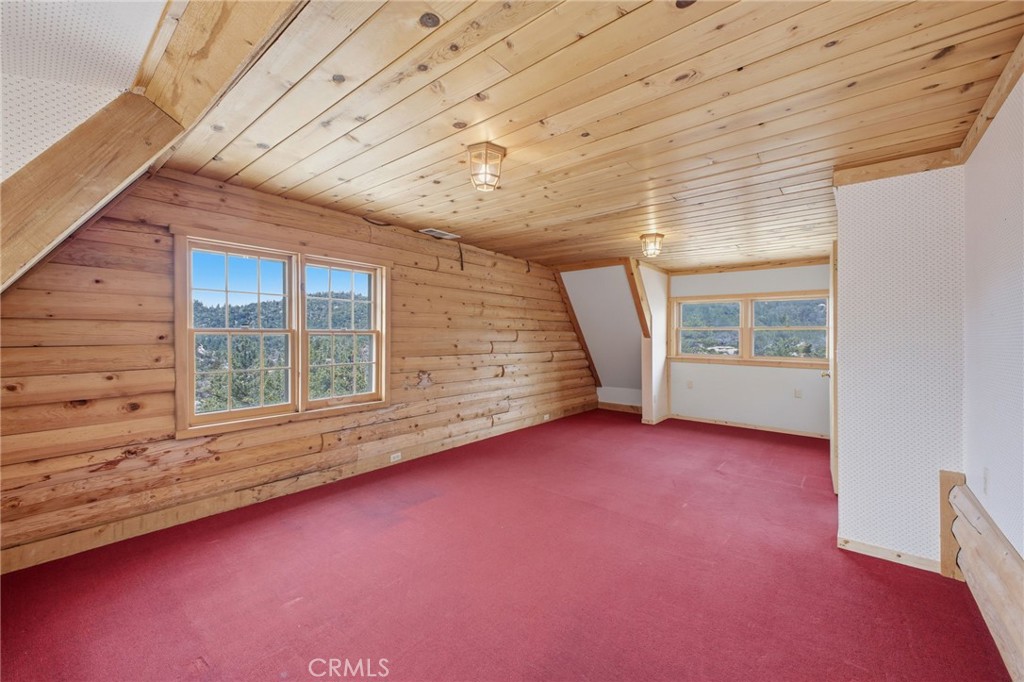 33052 Donner Lane Running Springs, CA 92382 - Photo 27 of 36 an empty room with windows