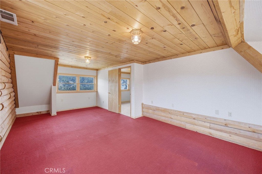 33052 Donner Lane Running Springs, CA 92382 - Photo 28 of 36 an empty room with windows