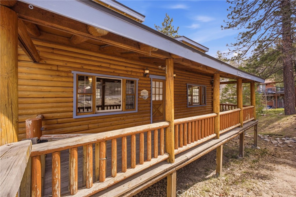 33052 Donner Lane Running Springs, CA 92382 - Photo 3 of 36 a view of a house with a large window