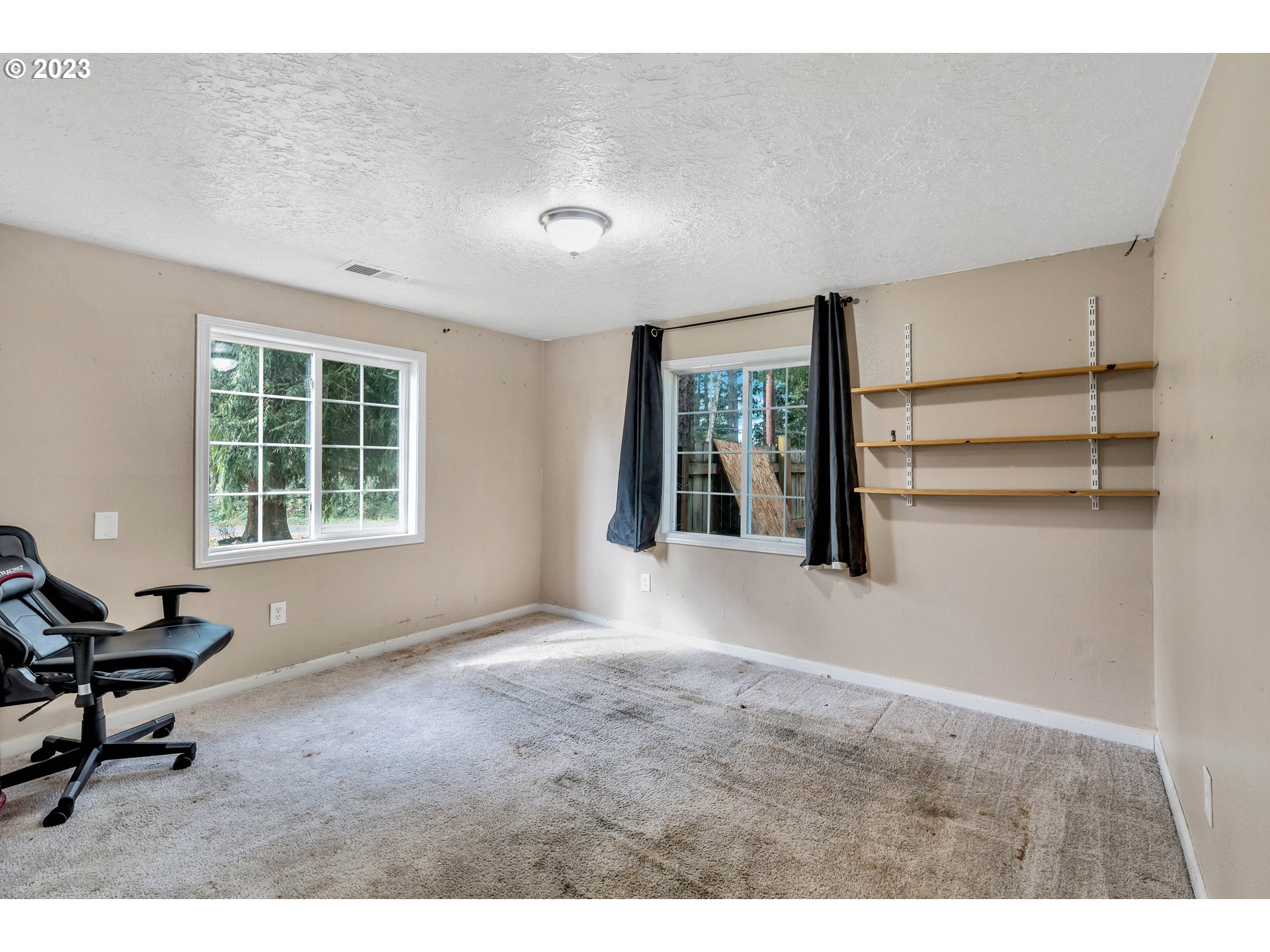 47431 Southeast Wagoneer Loop Sandy, OR 97055 - Photo 17 of 34 a living room with furniture and a window