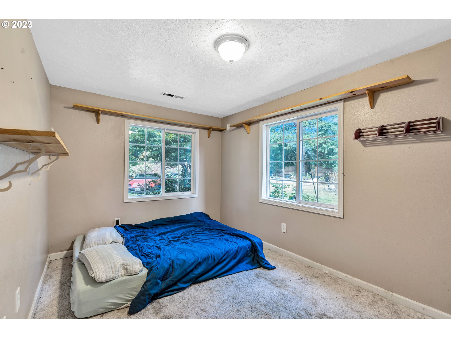 47431 Southeast Wagoneer Loop Sandy, OR 97055 - Photo 19 of 34 a bedroom with furniture and a window