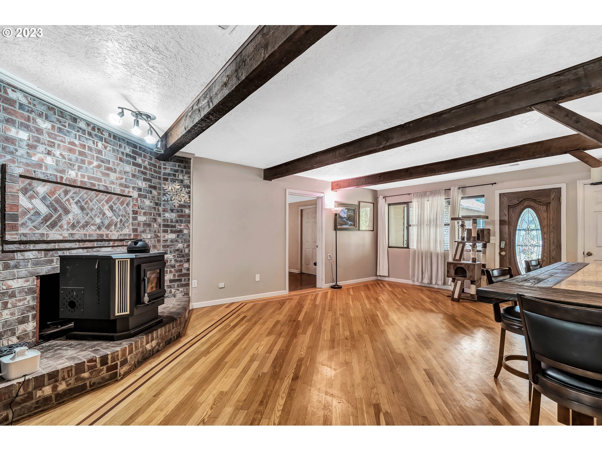 47431 Southeast Wagoneer Loop Sandy, OR 97055 - Photo 6 of 34 a view of livingroom with furniture and fireplace