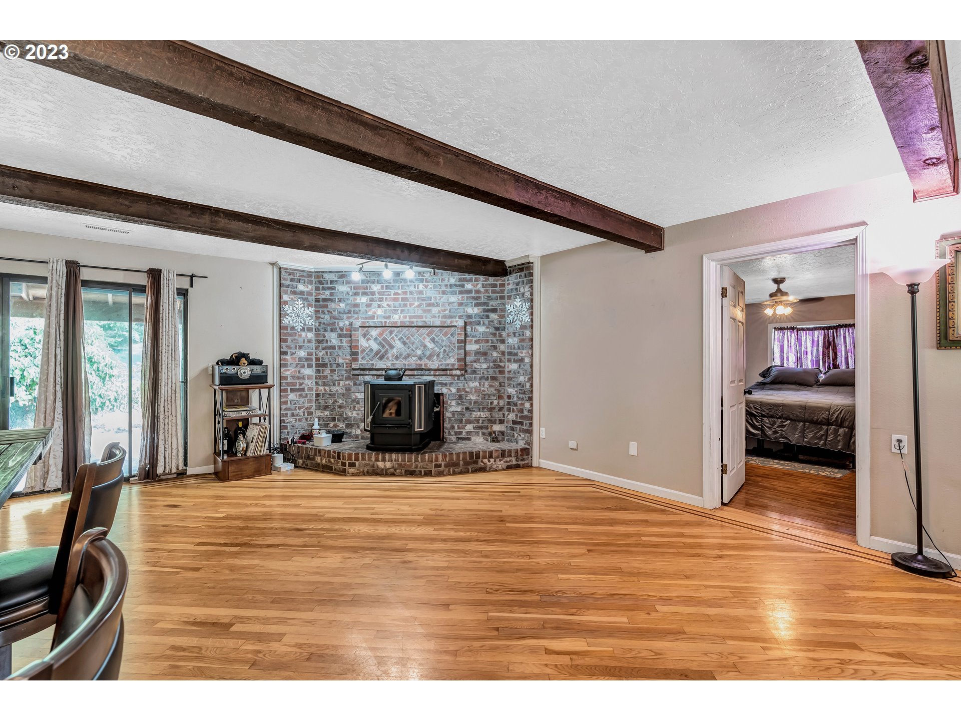 47431 Southeast Wagoneer Loop Sandy, OR 97055 - Photo 7 of 34 a view of a livingroom with a fireplace