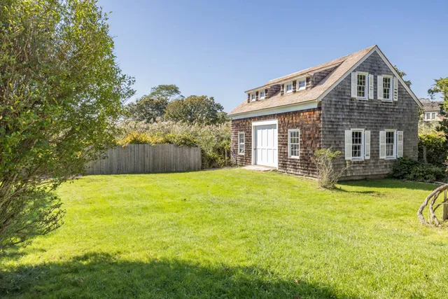 a view of swimming pool and a yard
