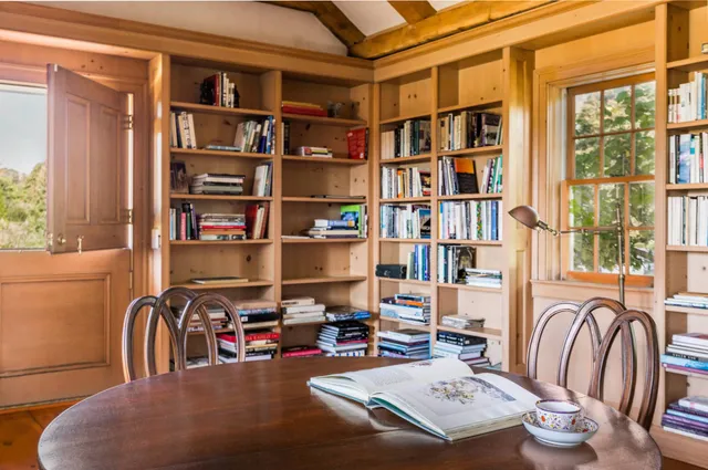 a view of a livingroom with furniture and toys
