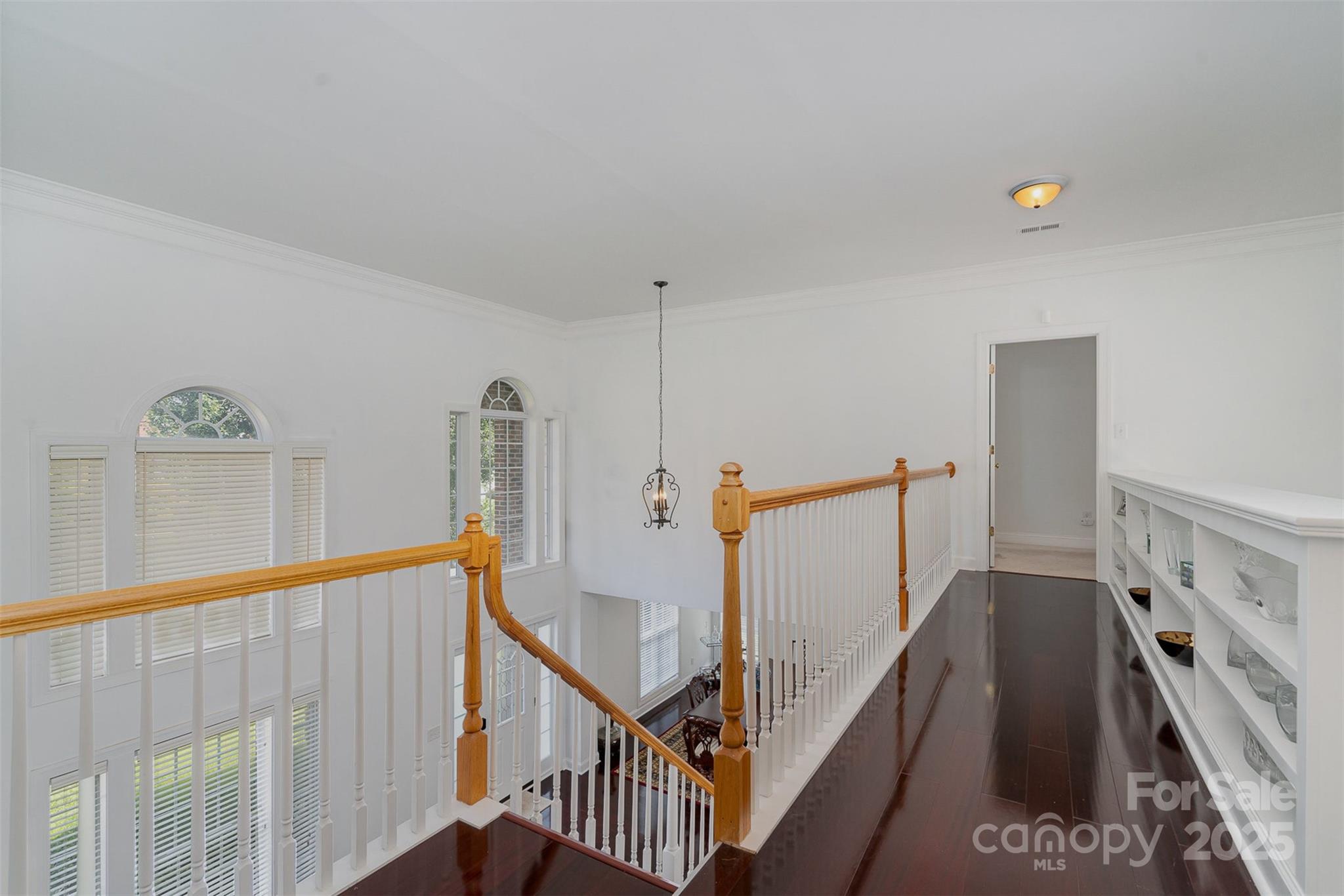 10929 Valley Spring Drive Charlotte, NC 28277 - Photo 16 of 43 a view of a hallway with staircase