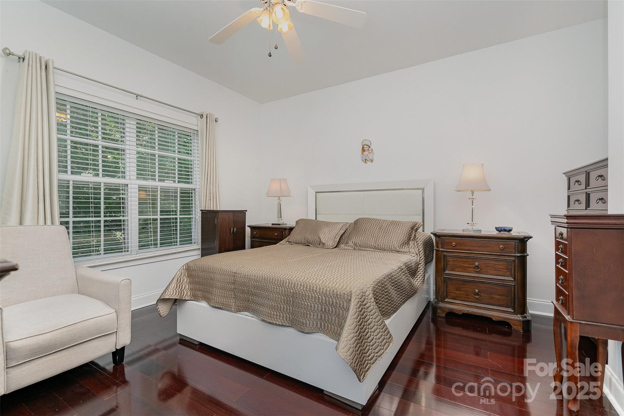 10929 Valley Spring Drive Charlotte, NC 28277 - Photo 23 of 43 a bedroom with a bed and a window