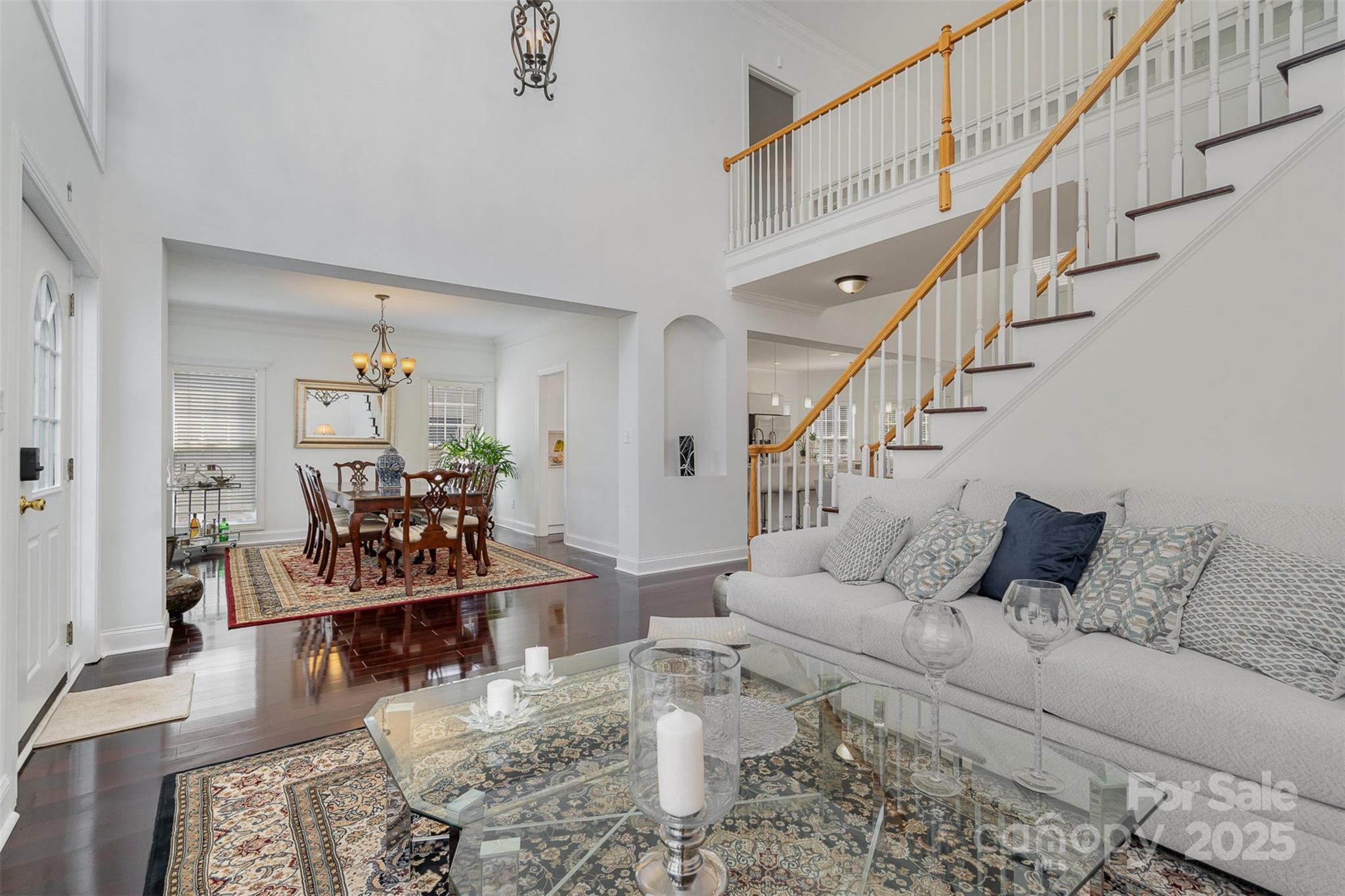 10929 Valley Spring Drive Charlotte, NC 28277 - Photo 3 of 43 a living room with furniture and wooden floor