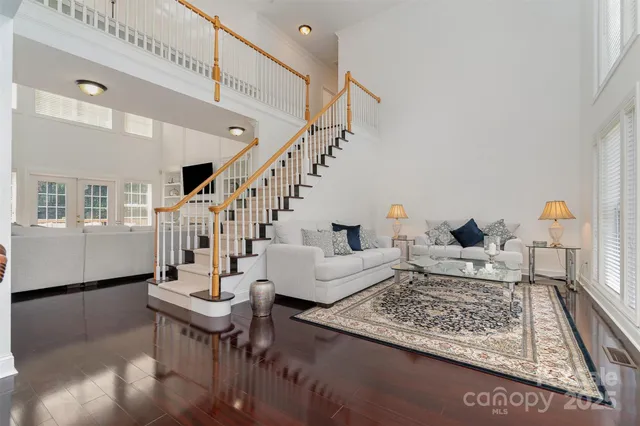 a living room with furniture and a rug
