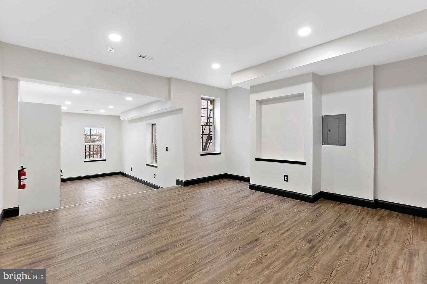 1732 McCulloh Street Baltimore, MD 21217 - Photo 22 of 30 a view of an empty room with wooden floor