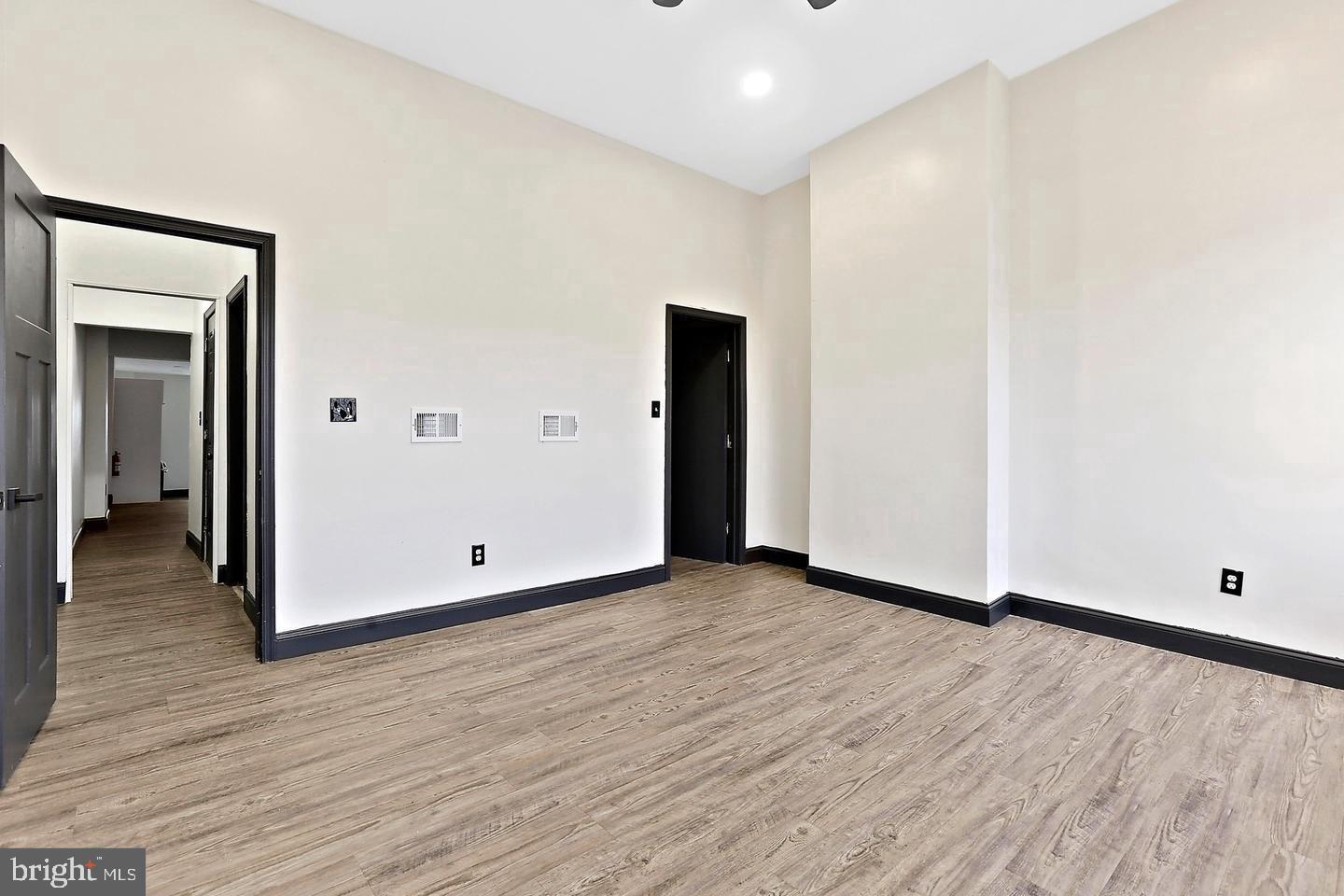 1732 McCulloh Street Baltimore, MD 21217 - Photo 29 of 30 a view of an empty room with wooden floor