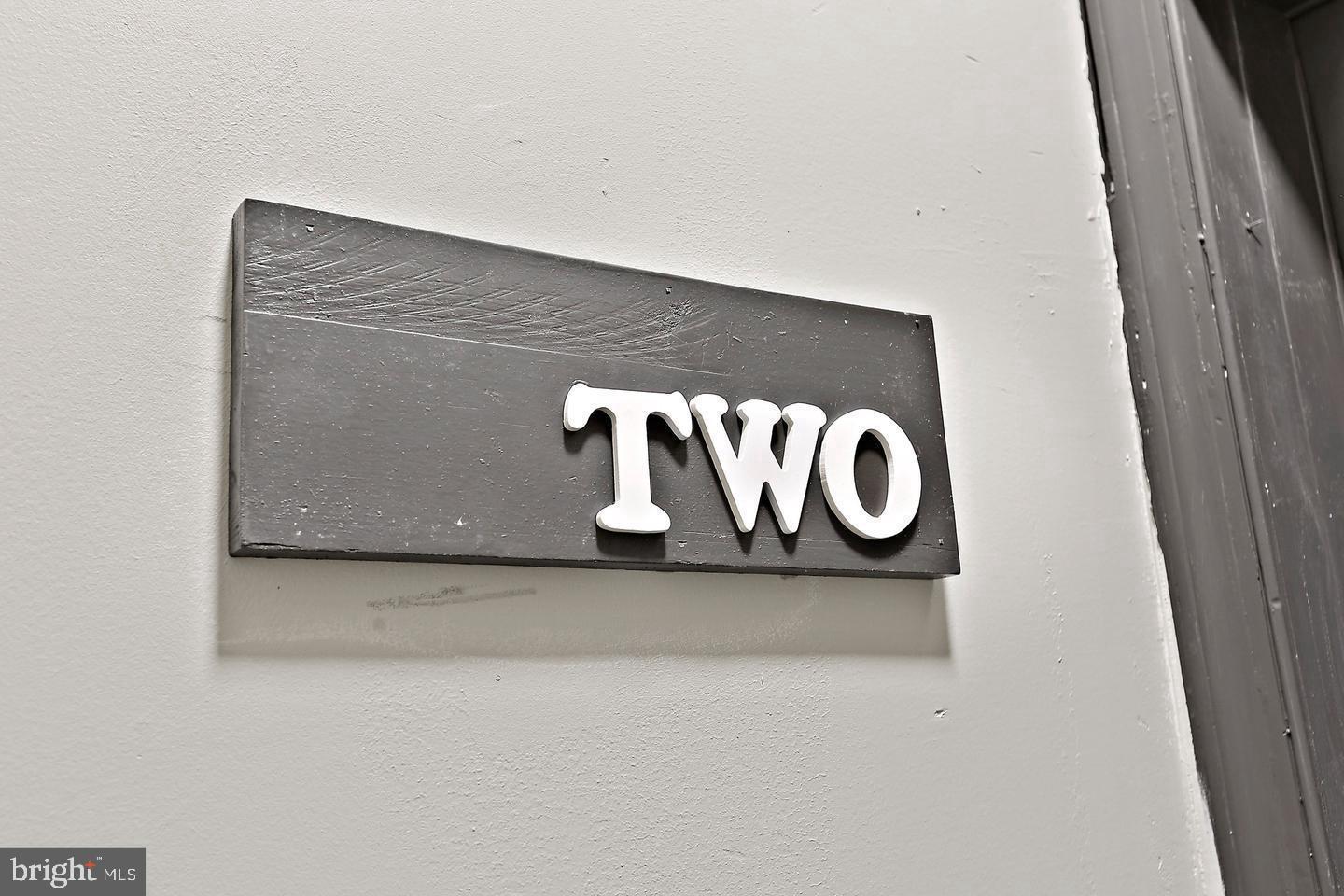 1732 McCulloh Street Baltimore, MD 21217 - Photo 10 of 30 a close up of a sign