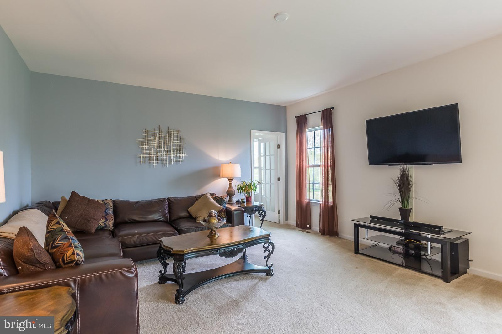 15045 North Ridge Boulevard Culpeper, VA 22701 - Photo 11 of 35 Custom-painted Family Room leads to Office