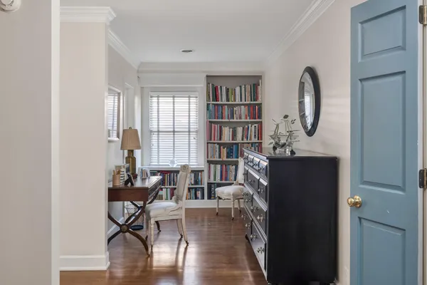a view of a livingroom with furniture and wooden floor
