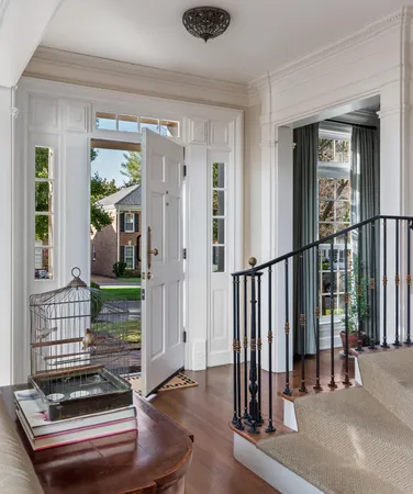 a view of entryway with wooden floor