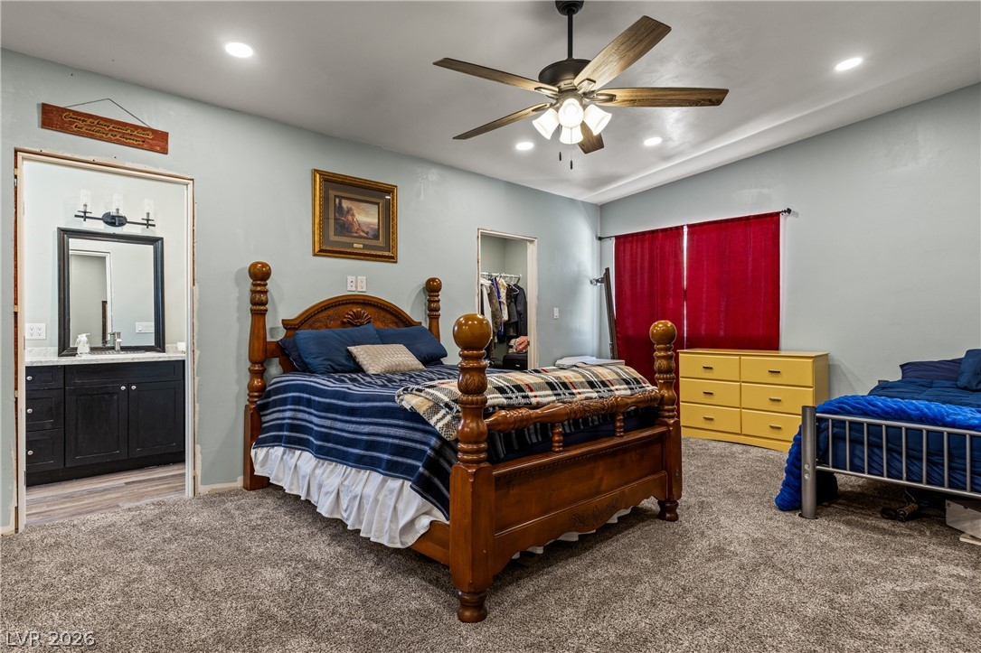 750 Leming Avenue Overton, NV 89040 - Photo 48 of 82 This spacious bedroom offers comfortable living with convenient access to an adjacent bath.