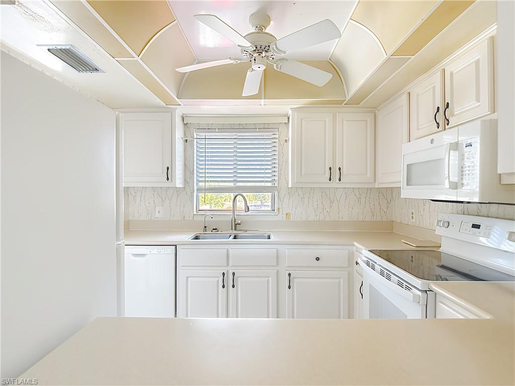 5635 Rattlesnake Hammock Road, Unit D203 Naples, FL 34113 - Photo 13 of 23 Kitchen