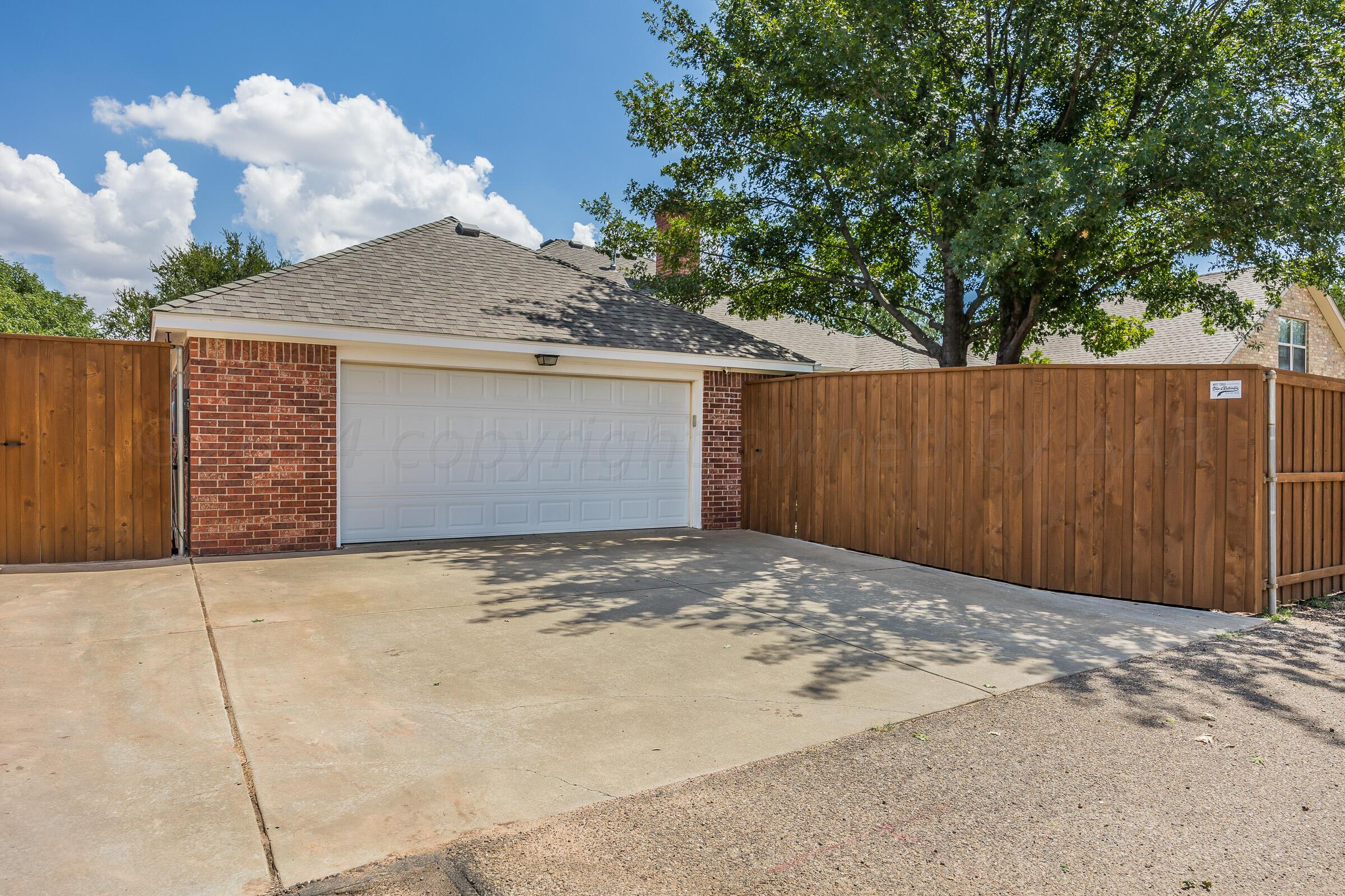 6012 Millie Place Amarillo, TX 79119 - Photo 9 of 27 027_Garage and Parking