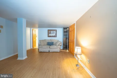 a bathroom with a sink a mirror and a shower