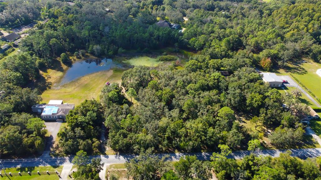 9670 Star Trail New Port Richey, FL 34654 - Photo 19 of 29 an aerial view of residential house with outdoor space and swimming pool