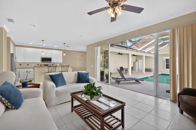 a view of a kitchen counter top space with furniture and living room