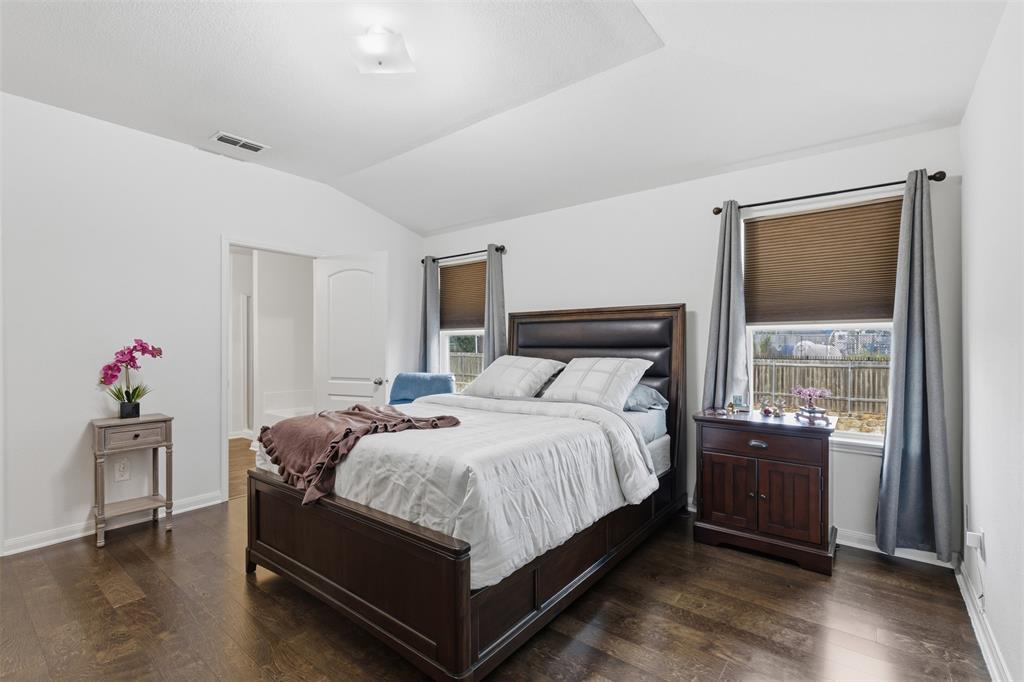 14229 Bridgeview Lane Dallas, TX 75253 - Photo 19 of 29 a bedroom with a bed and a window