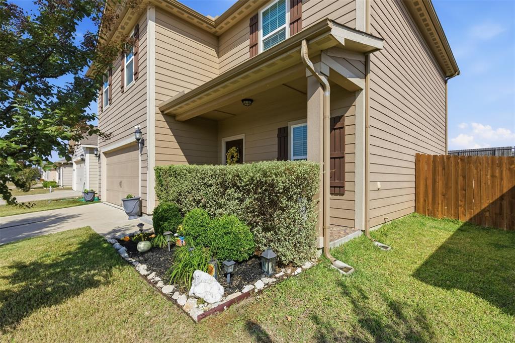 14229 Bridgeview Lane Dallas, TX 75253 - Photo 2 of 29 a view of a house with a yard