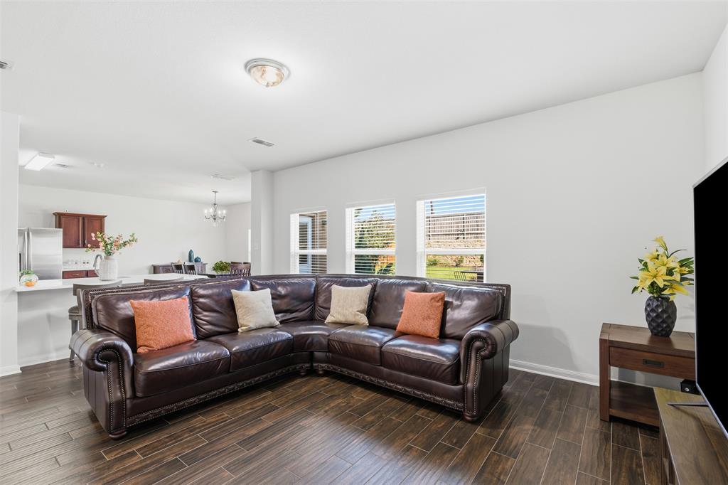 14229 Bridgeview Lane Dallas, TX 75253 - Photo 6 of 29 a living room with furniture and a wooden floor