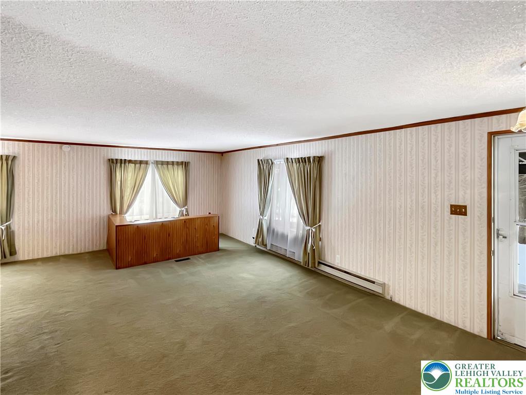 3406 Church Road Easton, PA 18045 - Photo 12 of 39 Living room with stairs to basement