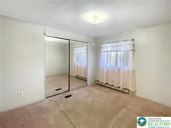 a view of a room with an empty space