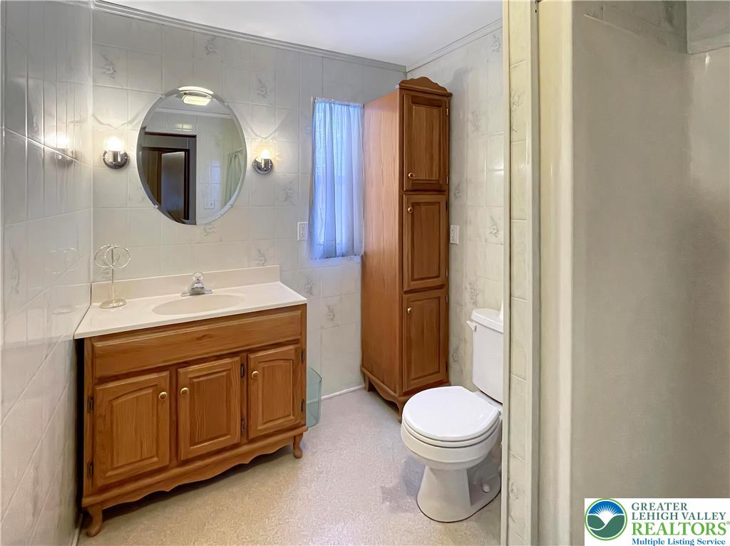 3406 Church Road Easton, PA 18045 - Photo 30 of 39 Full bathroom with cabinets