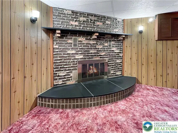 a living room with a fireplace