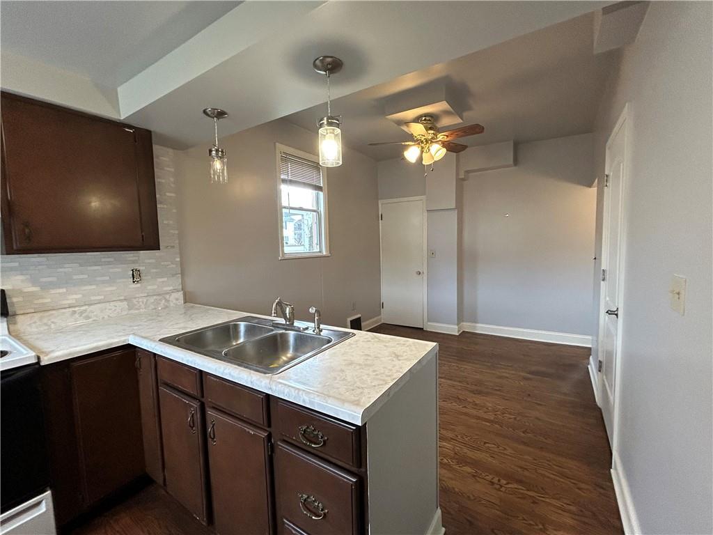 217 Arthur Street, Unit 1 Zelienople, PA 16063 - Photo 11 of 13 a bathroom with a sink a vanity and mirror