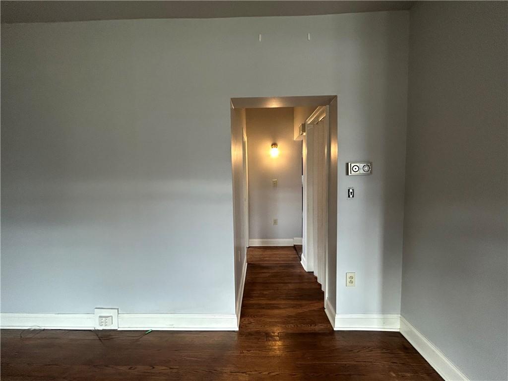 217 Arthur Street, Unit 1 Zelienople, PA 16063 - Photo 4 of 13 a view of a hallway with wooden floor